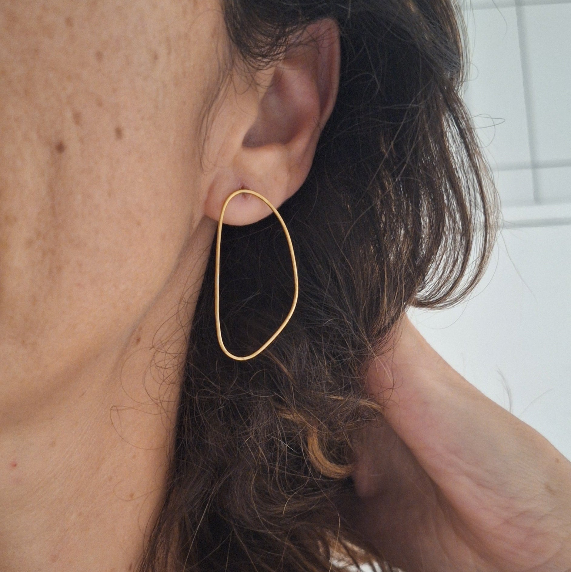 Woman wearing earrings